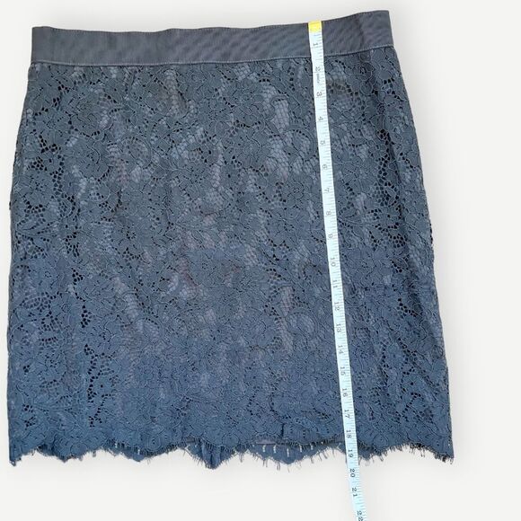 LOFT Black Lace Lined Stretch Waist Asymmetrical Scallop Hem Mini Skirt. 6. - Picture 4 of 7